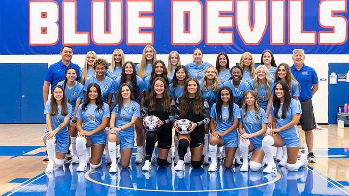 A group photo of the women's soccer team.